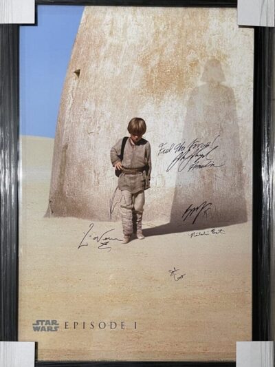Child standing in desert with shadow.