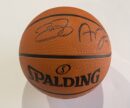 Autographed Spalding basketball with two signatures.