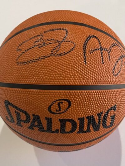 Autographed Spalding basketball with two signatures.