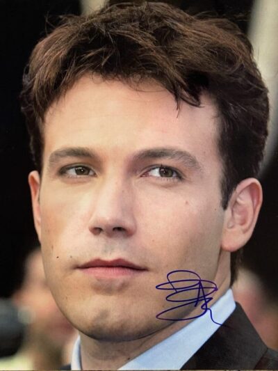 Man in suit with short brown hair.