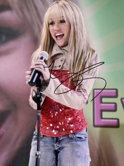 Young woman singing with a microphone.