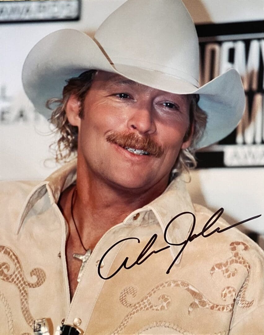 Man in cowboy hat with autograph.