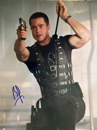 Man in tactical gear aiming a gun.