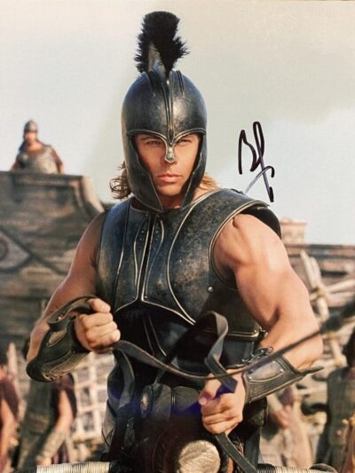 Warrior in armor holding a sword.