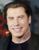 Man smiling in a portrait-style photograph.