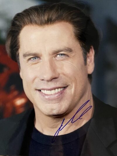 Man smiling in a portrait-style photograph.