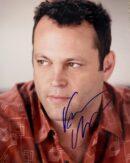 Man in patterned shirt with autograph.