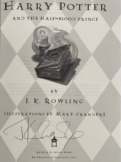 Harry Potter book cover with author's signature.