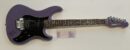 Purple electric guitar with autograph and ticket.