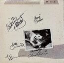 Fleetwood Mac album cover with signatures.