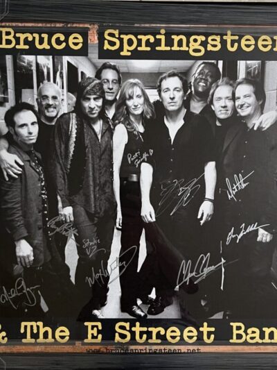 Band members posing for a group photo.