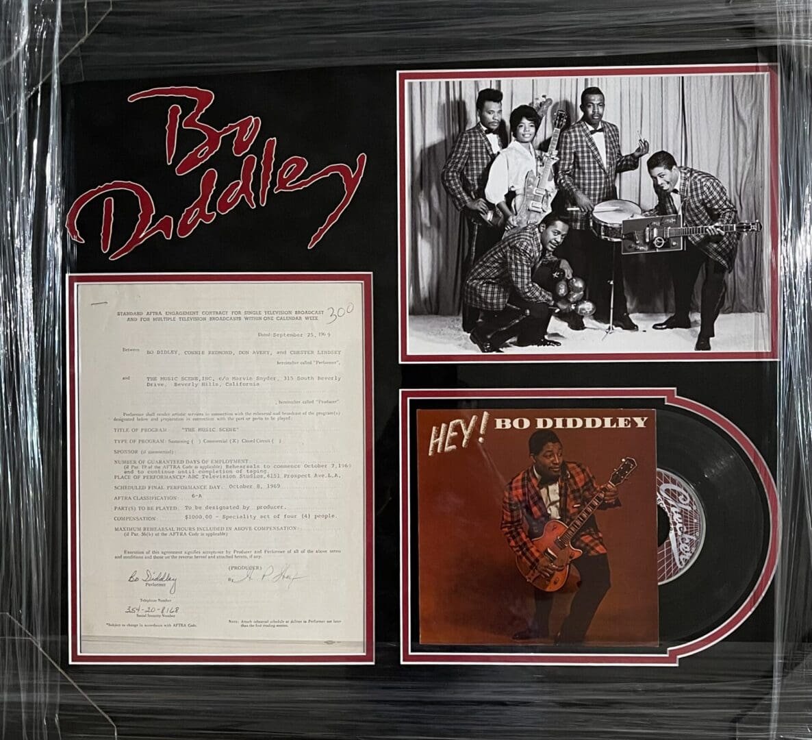Bo Diddley album cover and memorabilia display.