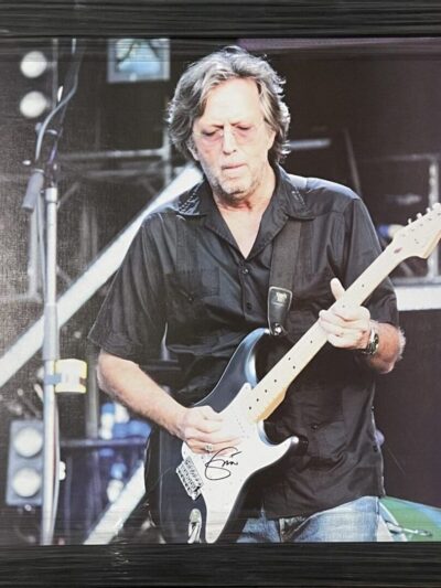 Person playing electric guitar