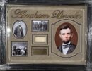 Framed Abraham Lincoln memorabilia with photographs.
