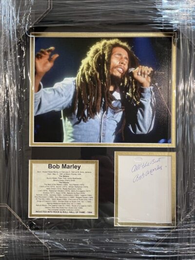 Framed Bob Marley photograph with signature.