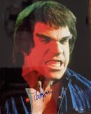 Man in costume with intense facial expression.