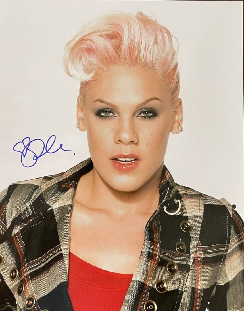 Person with short pink hair