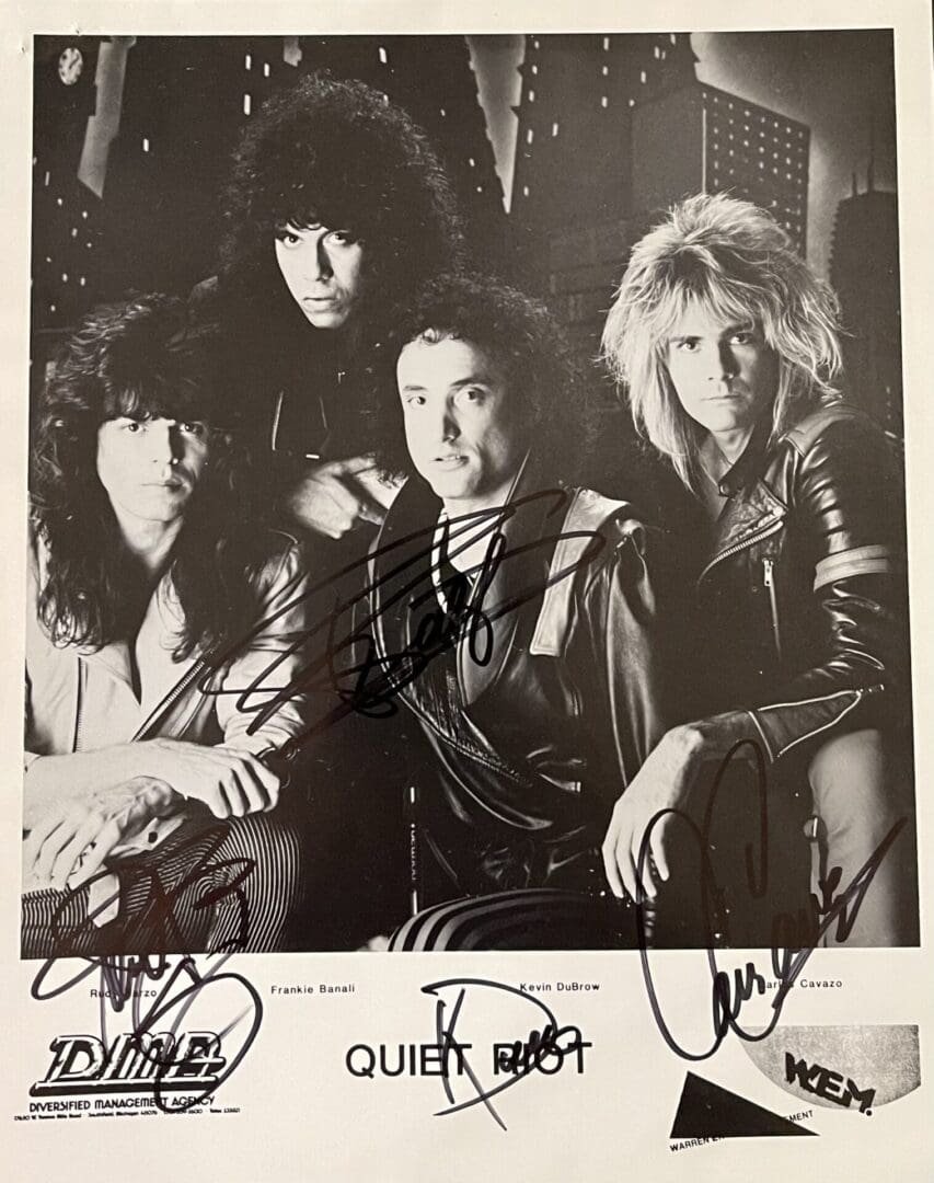 Band members posing for promotional photo.