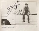 Man sitting on car