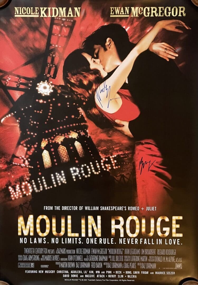 Moulin Rouge movie poster with embracing couple.