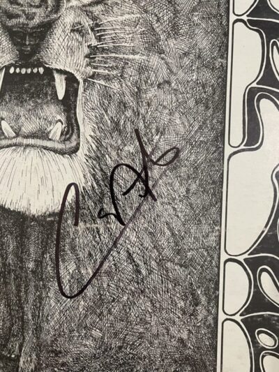 Lion illustration with bold black signature.