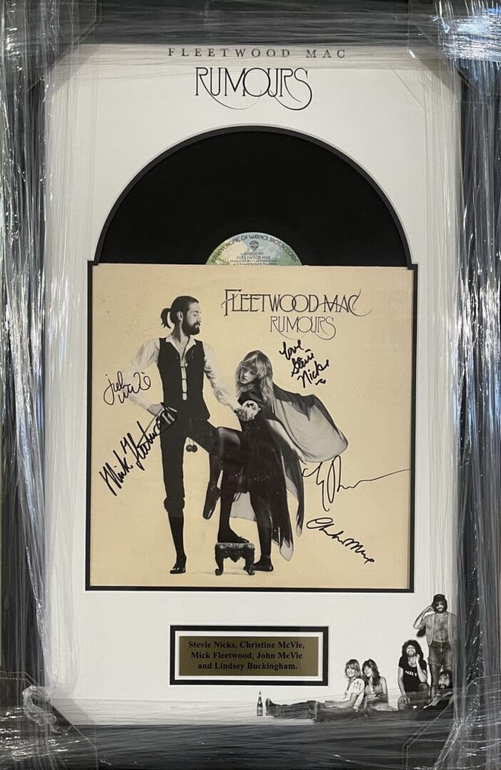 Framed Fleetwood Mac "Rumours" album with signatures.