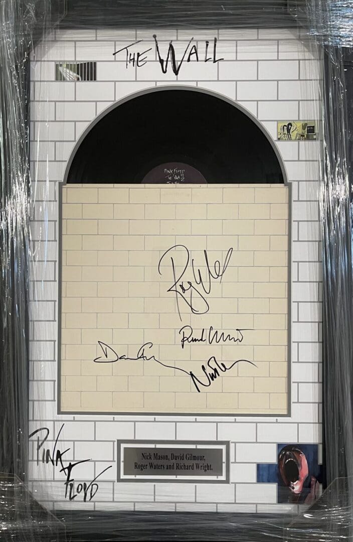 Framed signed Pink Floyd "The Wall" album.