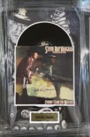 Stevie Ray Vaughan album display with autograph.