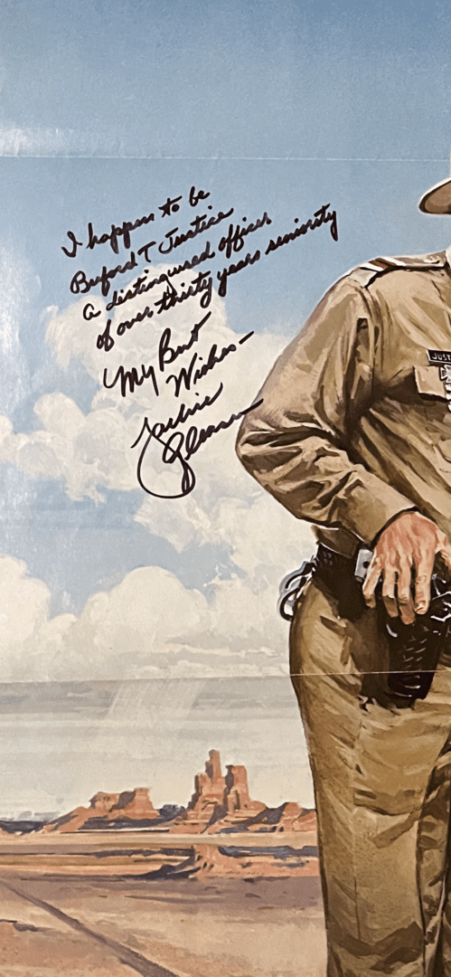 Western-themed painting with handwritten message.