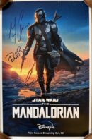 The Mandalorian poster with character walking.