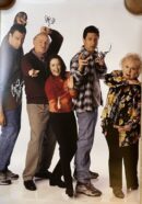 Five people posing with playful expressions.