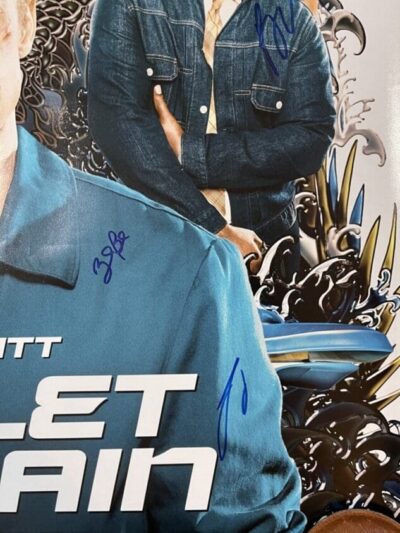 Movie poster with autographs and denim jacket.