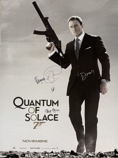 Man in suit holding gun