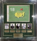 Framed Masters flag with golfer photos.