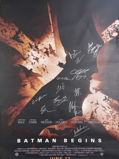 Batman Begins poster with multiple autographs.