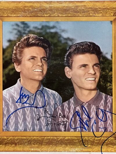 Two men smiling