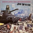 Album cover featuring tank and cityscape background.