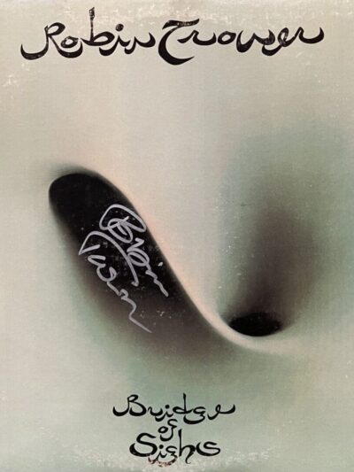 Abstract album cover with swirling design.