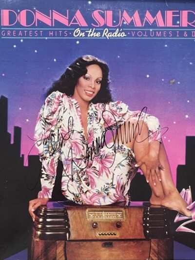 Album cover with woman in floral dress.