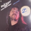 Man with long hair on album cover.
