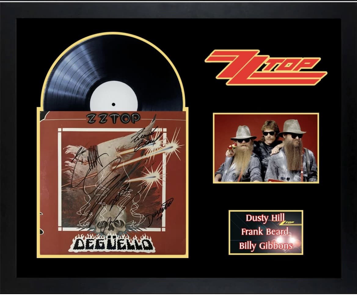ZZ Top album and signed memorabilia display.