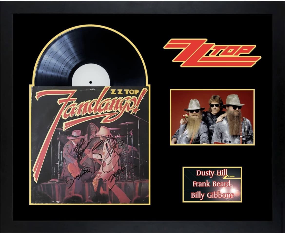 ZZ Top album cover with band signatures.