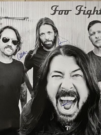 Three men with long hair