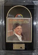 Framed Sinatra album and signature display.