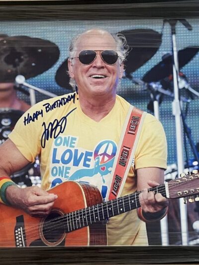 Musician playing guitar on stage
