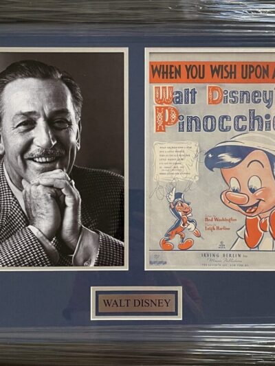 Framed photo and poster of Walt Disney.