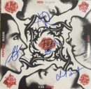 Album cover with floral and face design.