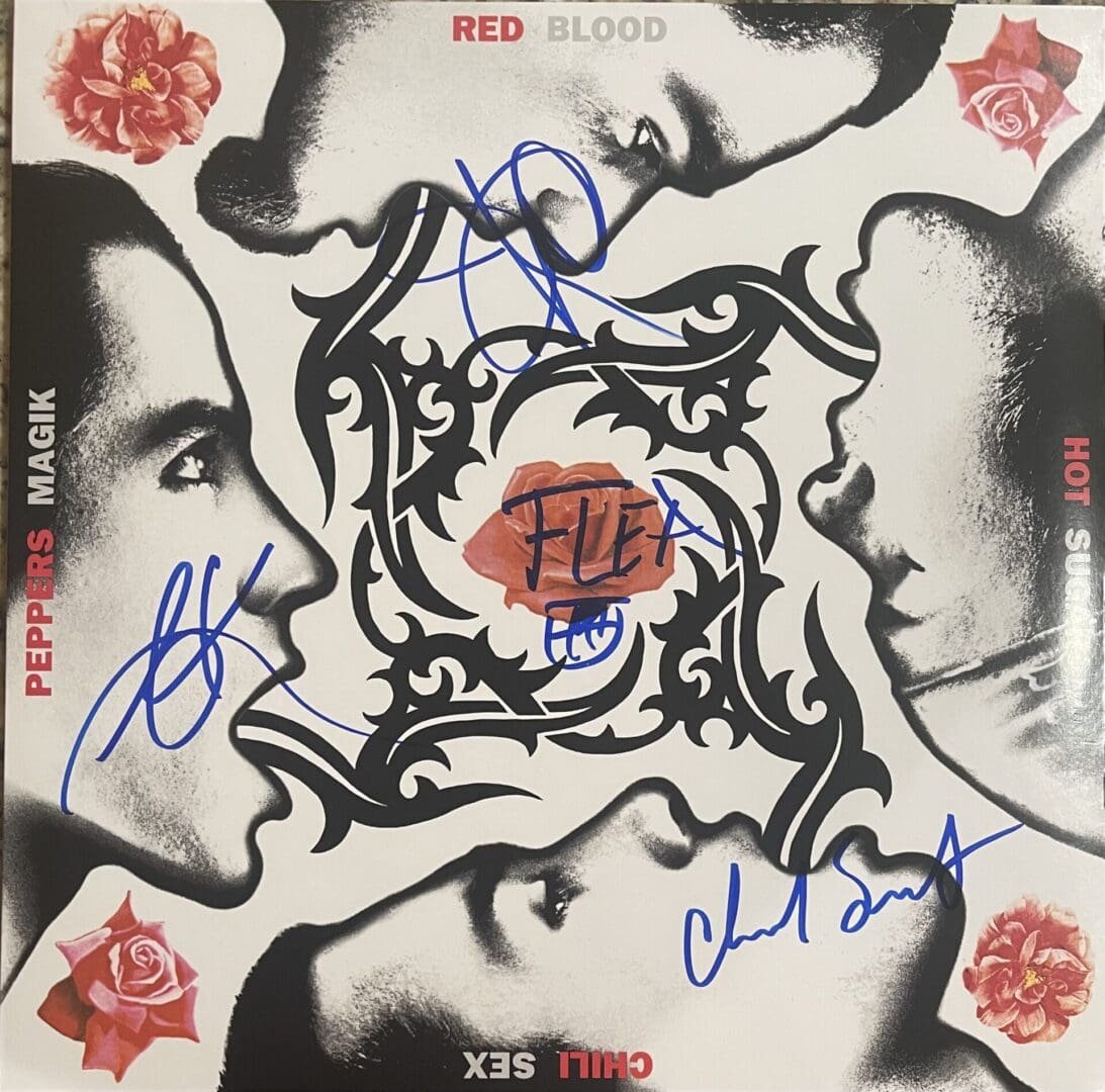 Album cover with floral and face design.