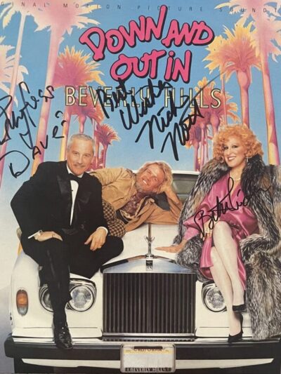 Three people posing on luxury car.