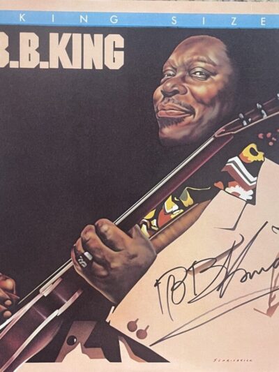 Illustration of musician with guitar and signature.